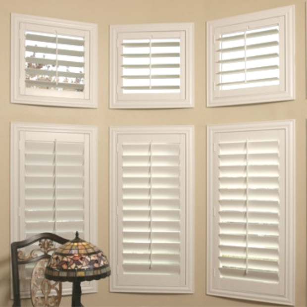 Sunburst shutters on a Destin bay window