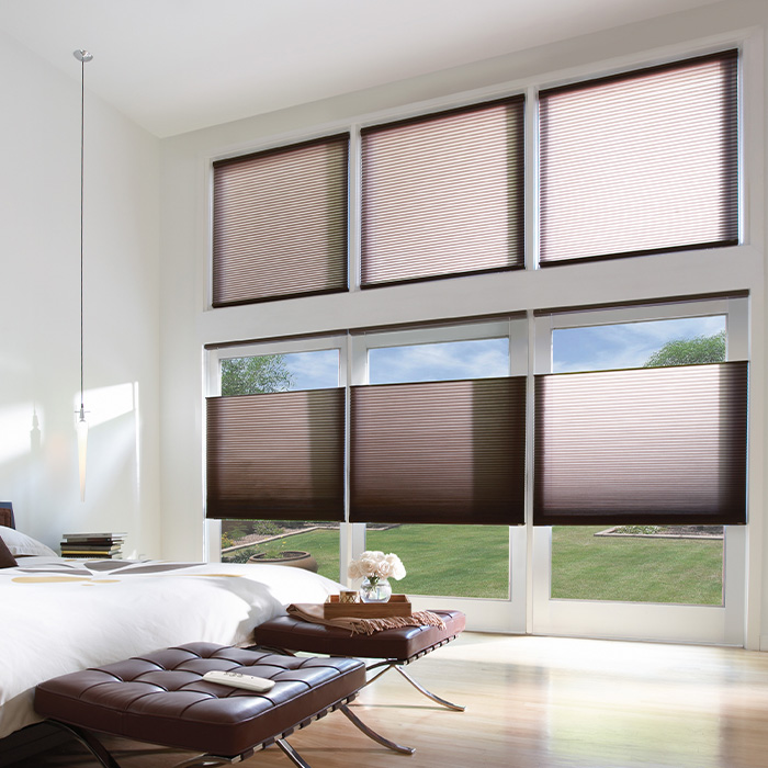 Brown shades in a bedroom.