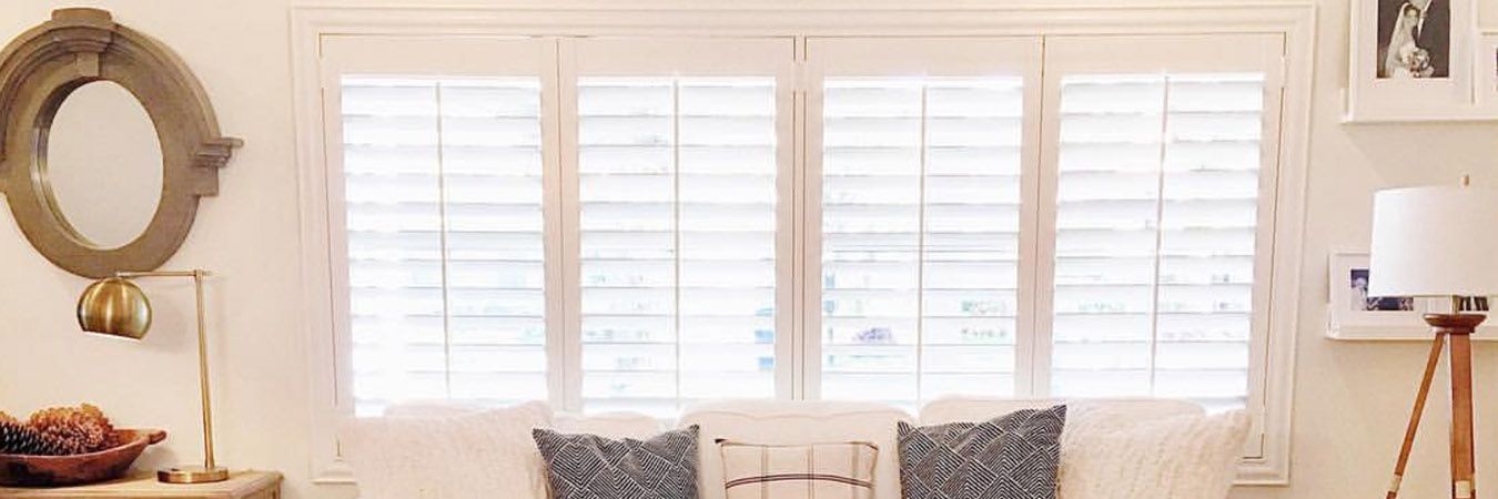 White Polywood shutters in a living room