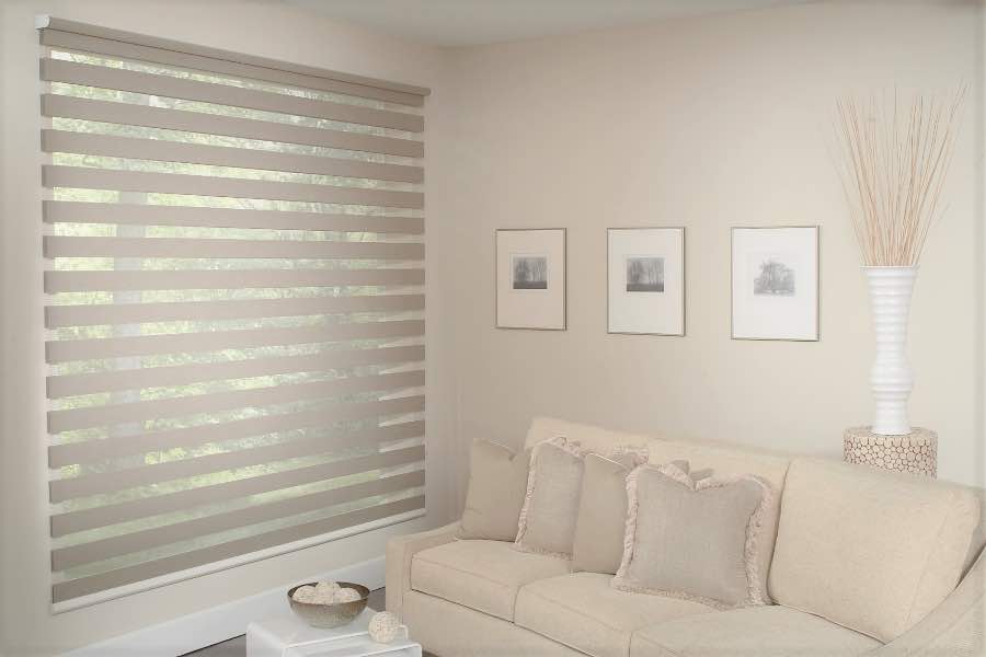 Zebra shades give you a unique combination of light control and style that benefits your Destin home. Zebra shade allows filtered light into a living room