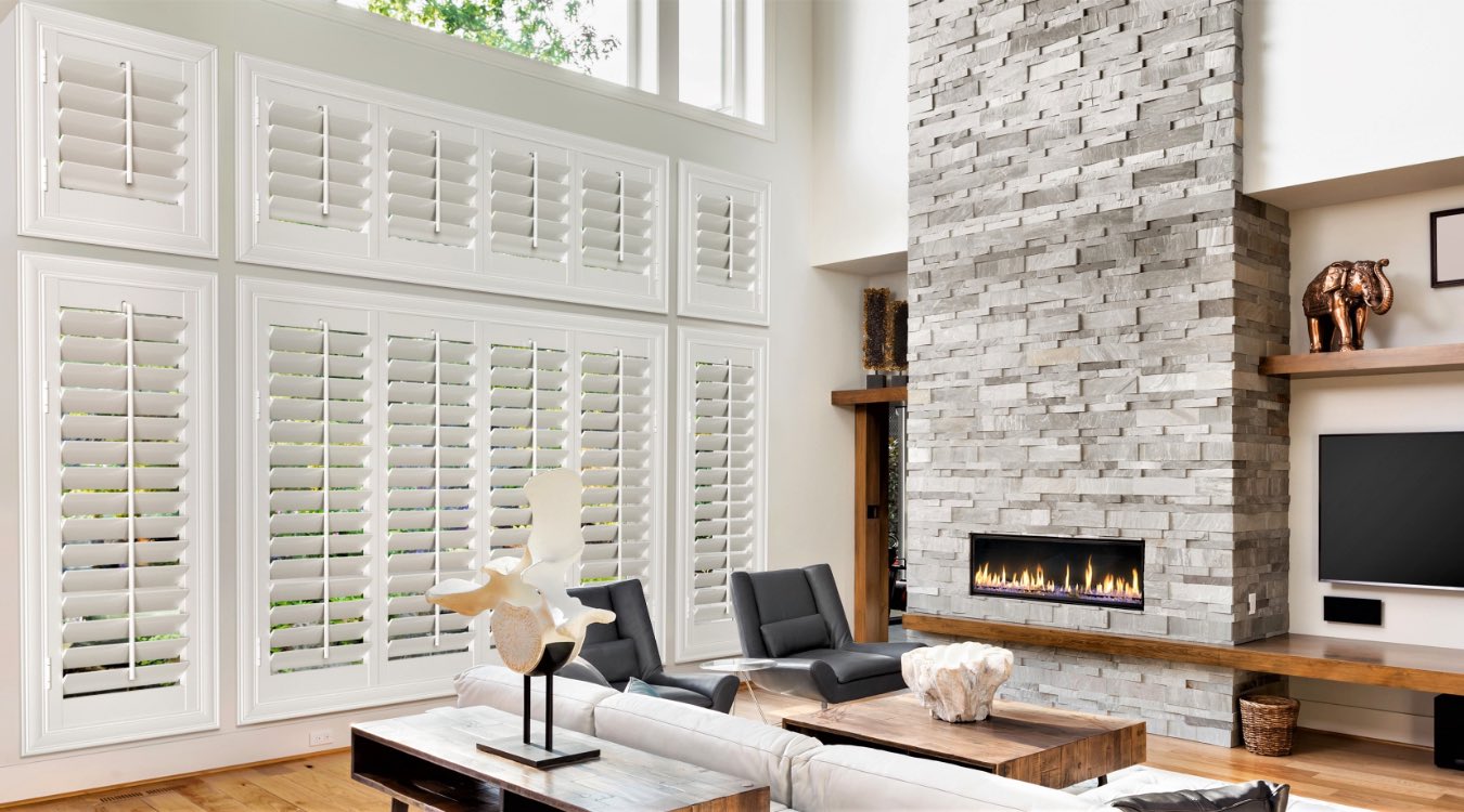 Interior shutters by fireplace