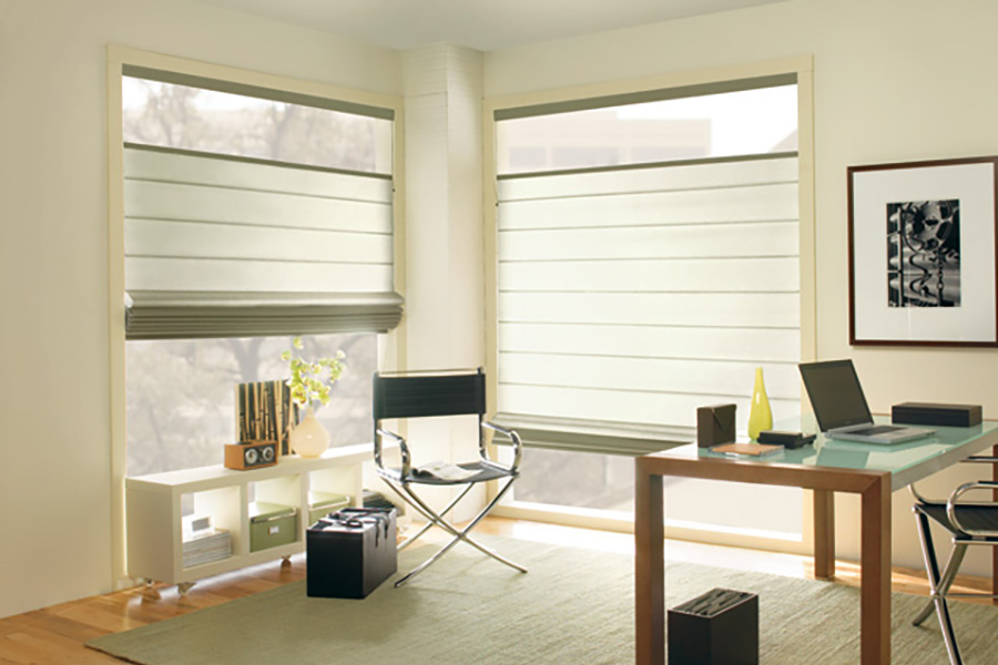 Modern Roman shades in a corner of an office.