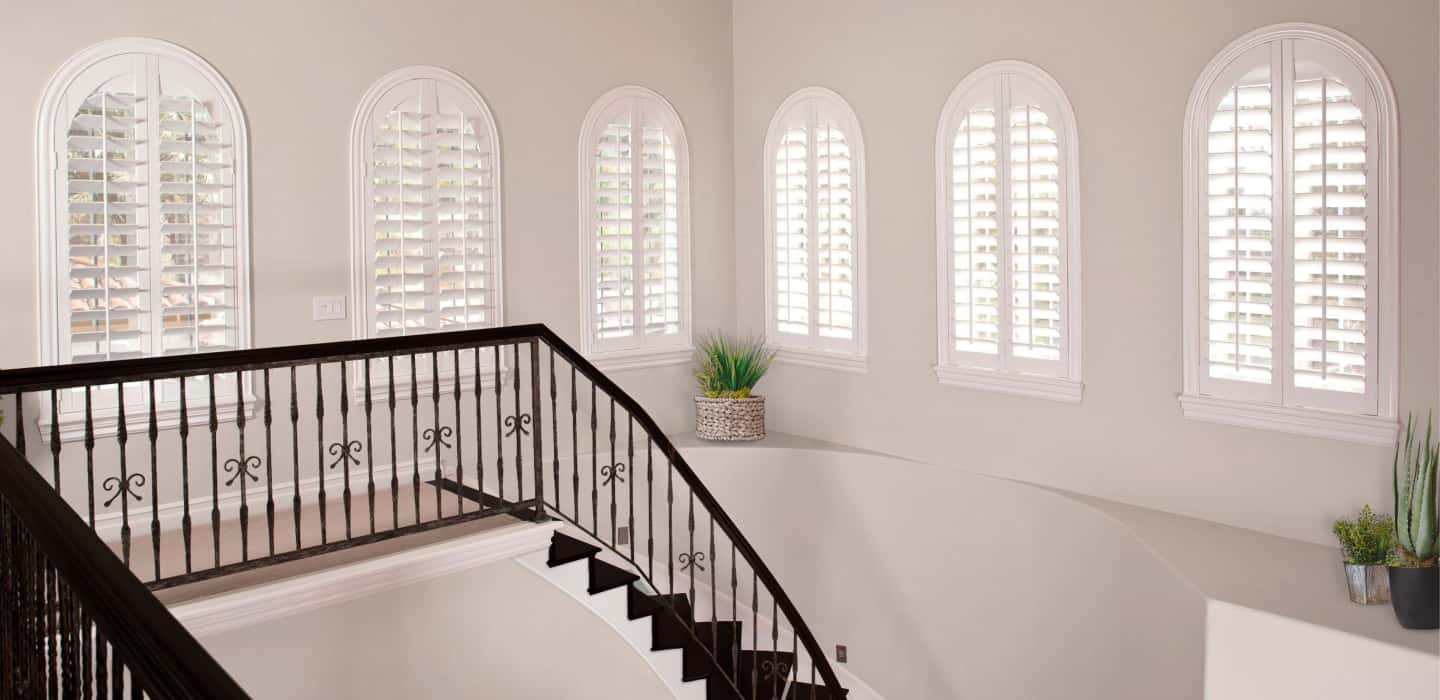 Custom-fitted treatments perfectly cover your window without sticking out and catching on the trim. Arched Plantation Shutters