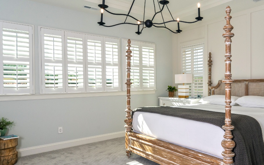 Interior shutters in a bedroom