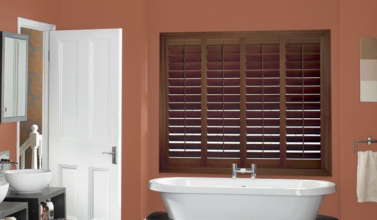 Put old paint to proper use and give your living space a fresh look. Plantation window treatments in a bathroom