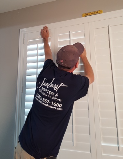 Shutter installation in Destin bedroom.