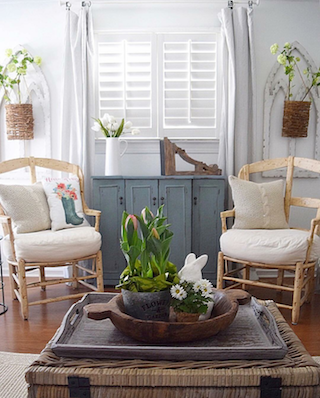 Plantation shutters in airy room.