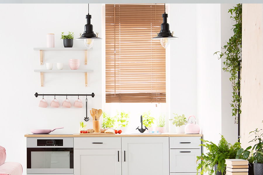  Beautiful and timeless white Polywood blinds are the perfect touch for your bathroom.