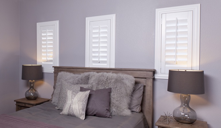 Studio shutters in a bedroom