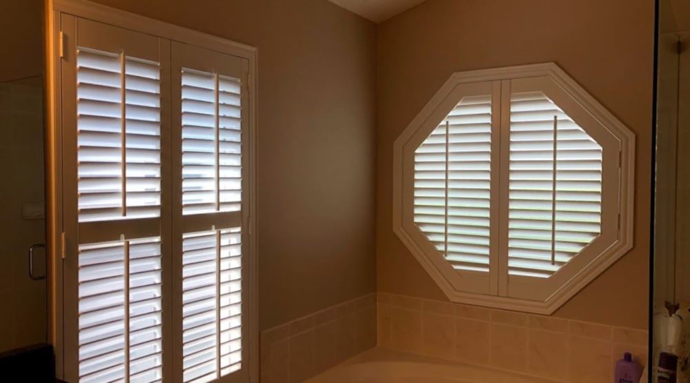 Octagon window treatments Octagon window in a Destin bathroom