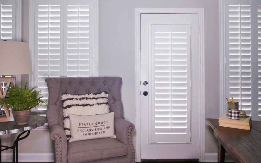 Interior shutters are beautiful and durable window treatments for glass doors in Destin. Polywood shutters on a door