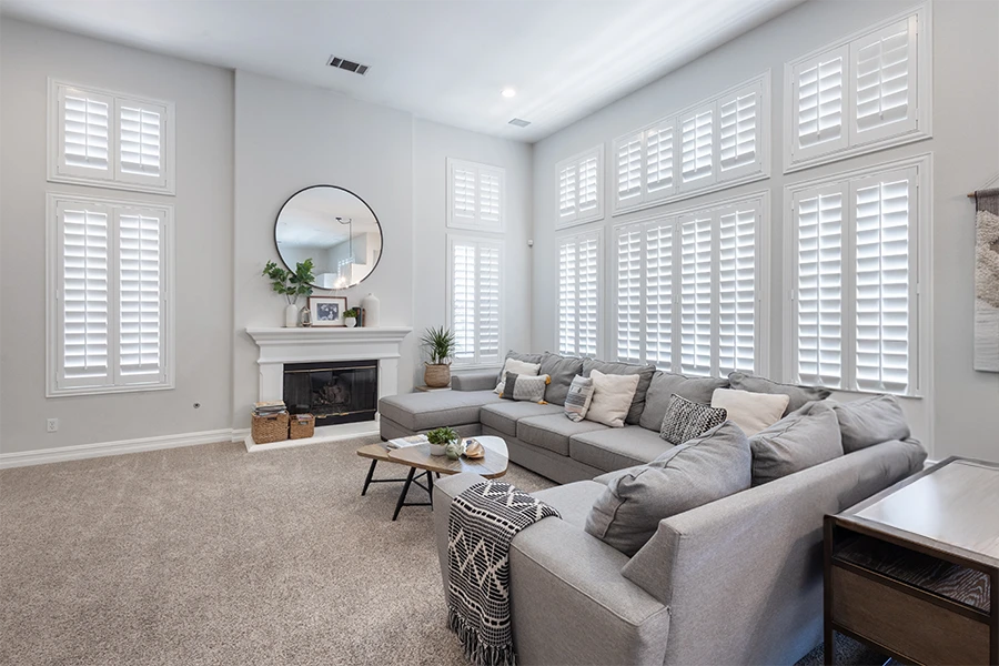White Polywood shutters on living room windows